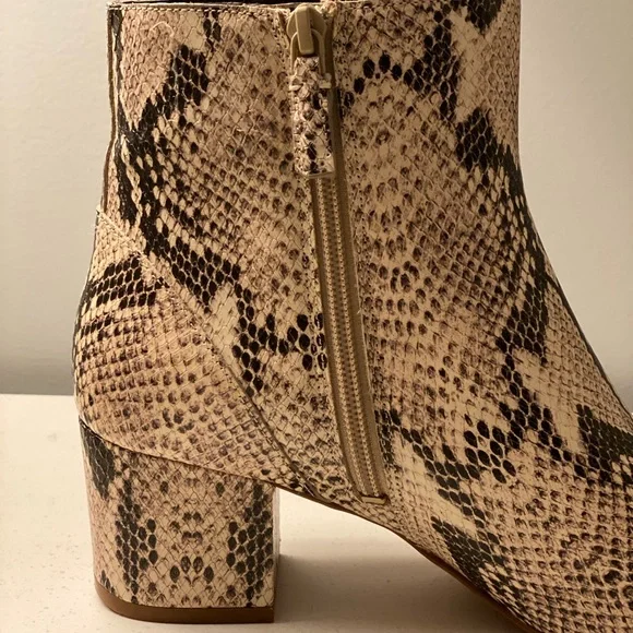 Size 9 Cole Haan sightly textured snake skin booties with gold accents. - Picture 4 of 6